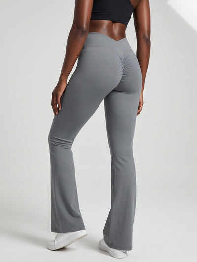 Elevate Flare Leggings gris, vue 3/4 dos en pied avec ceinture en V